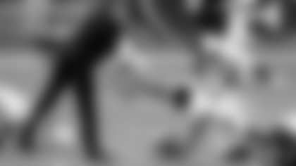 Washington Football Team head coach Ron Rivera greets outside linebacker Thomas Davis (58) prior to an NFL football game, Sunday, Dec. 13, 2020, in Glendale, Ariz. (AP Photo/Rick Scuteri)