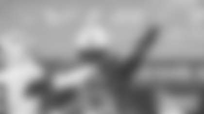 Kentucky linebacker Jamin Davis (44) rushes UT Martin quarterback John Bachus III (18) during the first half of an NCAA college football game in Lexington, Ky., in this Saturday, Nov. 23, 2019, file photo. (AP Photo/Bryan Woolston, FIle)