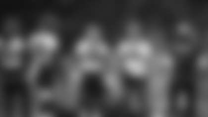 From left: Peyton Barber, Lamar Miller, Jaret Patterson, Antonio Gibson and running backs coach Randy Jordan prepare to go through individual drills during minicamp. (Emilee Fails/Washington Football Team)