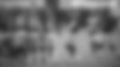 Alex Smith approaches the huddle during the Washington Football Team's game against the Los Angeles Rams. (Elijah Walter Griffin Sr./Washington Football Team)