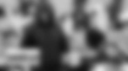 Washington Football Team head coach Ron Rivera greeting wide receiver Cam Sims (89) before the start of an NFL football game against the Carolina Panthers, Sunday, Dec. 27, 2020, in Landover, Md. (AP Photo/Mark Tenally)