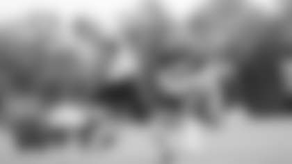 Dax Milne makes the catch while working against Jimmy Moreland during practice. (Emilee Fails/Washington Football Team)