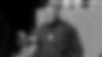 Juan Castillo walks on the field prior to an NFL football game against the Green Bay Packers, Sunday, Oct. 17, 2021, in Chicago. (AP Photo/Kamil Krzaczynski)