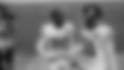 Jimmy Moreland celebrates a win over the San Francisco 49ers with Shaun Dion Hamilton. (Riley Trujillo/NFL)