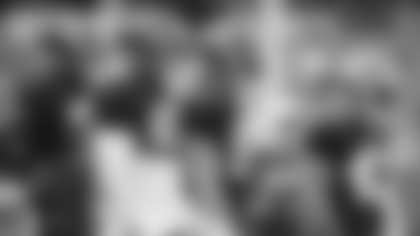 Jamin Davis, Cole Holcomb, Jon Bostic and Khaleke Hudson go through warmup before practice at FedExField. (Emilee Fails/Washington Football Team)