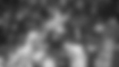 Linebacker Cole Holcomb puts pressure on Jalen Hurts during the Washington Football Team's game against the Philadelphia Eagles. (Karlee Sell/Washington Football Team)