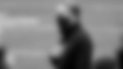 Washington Football Team defensive coordinator Jack Del Rio places his hand over his heart during the National Anthem prior to an NFL football game between the Seattle Seahawks and the Washington Football Team, Sunday, Dec. 20, 2020, in Landover, Md. (AP Photo/Mark Tenally)