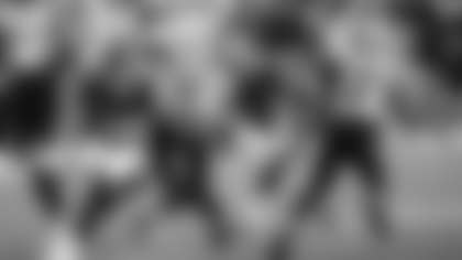 Chase Young tries to make a tackle on Curtis Samuel during the Washington Football Team's game against the Carolina Panthers. (Emilee Fails/Washington Football Team)