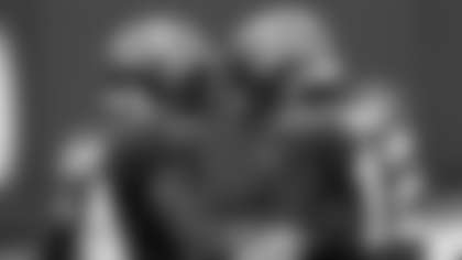 Tampa Bay Buccaneers quarterback Tom Brady (12) congratulates wide receiver Chris Godwin (14) after Godwin caught a 7-yard touchdown reception during the first half of an NFL football game against the Atlanta Falcons Sunday, Jan. 3, 2021, in Tampa, Fla. (AP Photo/Jason Behnken)