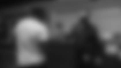 Washington Football Team head coach Ron Rivera speaks with first-round draft pick Jamin Davis as he visits Inova Sports Performance Center for the first time. (Emilee Fails/Washington Football Team)