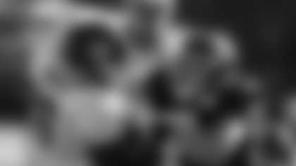 Washington offensive tackle Morgan Moses (76) and defensive end Ryan Kerrigan (91) work during practice at the team's NFL football training facility, Tuesday, Aug. 18, 2020, in Ashburn, Va. (AP Photo/Alex Brandon)