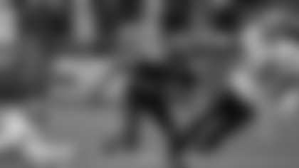 Seattle Seahawks wide receiver Bobby Engram (84) turns up field as Washington Redskins cornerback Shawn Springs (24) and linebacker Marcus Washington (53) move in during an NFL football wildcard playoff game Saturday, Jan. 5, 2008, at Qwest Field in Seattle. (AP Photo/Elaine Thompson)