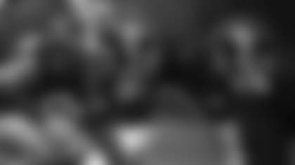 Chase Young and Jonathan Allen get in their stand before the offense runs a play during minicamp. (Emilee Fails/Washington Football Team)