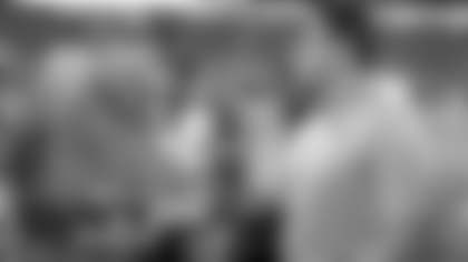 Kansas City Chiefs head coach Andy Reid, left, shakes hands with Carolina Panthers head coach Ron Rivera, right, after a preseason NFL football game in Charlotte, N.C., Sunday, Aug. 17, 2014. The Panthers won 28-16. (AP Photo/Bob Leverone)