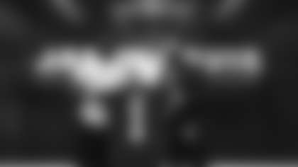 Washington Football Team first-round linebacker Jamin Davis (left) and head coach Ron Rivera pose for a photo at the Inova Sports Performance Center on April 30, 2021. (Emilee Fails/Washington Football Team)