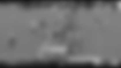 Jaret Patterson slips through airtight running lanes to pick up a first down