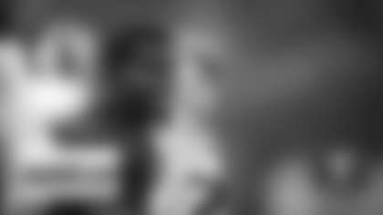 Jamin Davis warms up before practice on Aug. 18. (Emilee Fails/Washington Football Team)