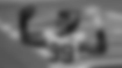 Chase Young celebrates a fumble recovery for a touchdown against the San Francisco 49ers. (Riley Trujillo/NFL)