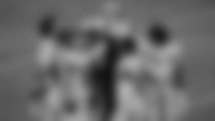 The Washington Football Team's linebackers come together during warmups for their game against the Philadelphia Eagles. (Washington Football Team)