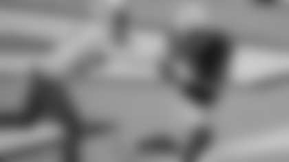 North Carolina wide receiver Dyami Brown (2) scores a touchdown as Virginia Tech defensive back Armani Chatman (27) chases during the first half of an NCAA college football game in Chapel Hill, N.C., Saturday, Oct. 10, 2020. (AP Photo/Gerry Broome)