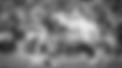 Antonio Gibson attempts to run through defenders during the Washington Football Team's game against the Denver Broncos. (Emilee Fails/Washington Football Team)