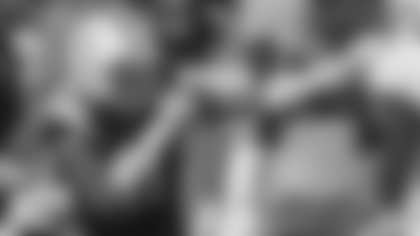 Virginia linebacker Charles Snowden (11) runs in front of Virginia linebacker Jordan Mack (4) as he celebrates a defensive stop during the fourth quarter of an NCAA college football game against Old Dominion in Charlottesville, Va., Saturday, Sept. 21, 2019. (AP Photo/Andrew Shurtleff)