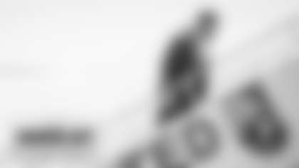 Ron Rivera walks up the ramp to the team plane as Washington travel to play the New England Patriots. (Emilee Fails/Washington Football Team)