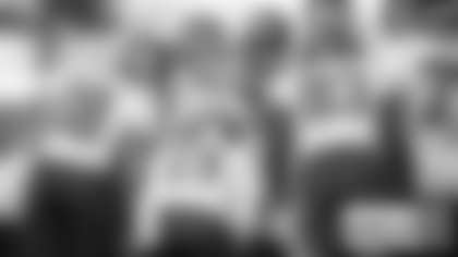 Taylor Heinicke gives a play to his teammates in the huddle. (Karlee Sell/Washington Football Team)