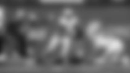 Tulane's Tyjae Spears runs from Tulsa defenders during an NCAA college football game  in Tulsa, Okla. on Saturday, Nov. 5, 2022. (AP Photo/Dave Crenshaw)