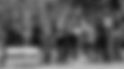 The Washington Football Team's defense relaxes between plays during practice. (Emilee Fails/Washington Football Team)