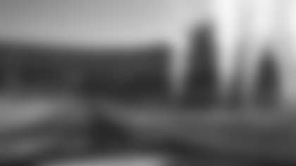 Washington Football Team players run out onto FedExField before a game during the 2020 season. (Emilee Fails/Washington Football Team)