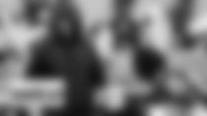 Washington Football Team head coach Ron Rivera greeting wide receiver Cam Sims (89) before the start of an NFL football game against the Carolina Panthers, Sunday, Dec. 27, 2020, in Landover, Md. (AP Photo/Mark Tenally)