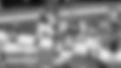 Washington Football Team's Montez Sweat, second from left, and Ryan Kerrigan (91) celebrate Sweat's interception of a pass by Dallas Cowboys' Andy Dalton that Sweat ran back for a touchdown during the second half of an NFL football game in Arlington, Texas, Thursday, Nov. 26, 2020. Kamren Curl (31), Jeremy Reaves (39), Daron Payne (94), Jon Bostic (53) and Chase Young (99) run to join the celebration. (AP Photo/Roger Steinman)