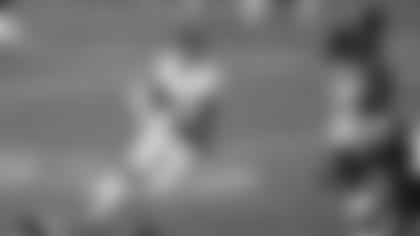 J.D. McKissic tries to evade two Pittsburgh Steelers defenders during Monday night's 23-17 win. (Alex Mowrey/Pittsburgh Steelers)