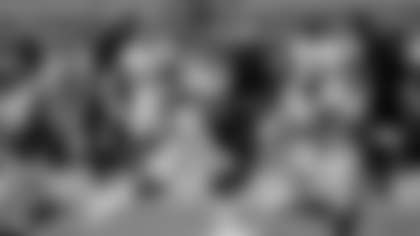 Washington Football Team defensive end Chase Young (99) runs back a fumble recovery for a touchdown against the San Francisco 49ers during the first half of an NFL football game, Sunday, Dec. 13, 2020, in Glendale, Ariz. (AP Photo/Ross D. Franklin)