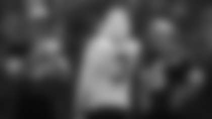 Camaron Cheeseman talks with Dustin Hopkins and Tress Way before practice. (Emilee Fails/Washington Football Team)