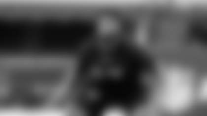 Florida offensive lineman O'Cyrus Torrence runs a drill at the NFL football scouting combine in Indianapolis, Sunday, March 5, 2023. (AP Photo/Darron Cummings)