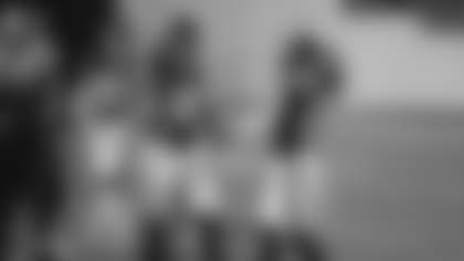 Chase Young and Cole Holcomb celebrate a play during the Washington Football Team's game against the Carolina Panthers. (Elijah Walter Griffin Sr./Washington Football Team)