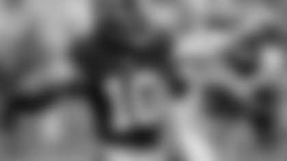 Washington Redskins' Robert Griffin III (10) looks to throw against the Houston Texans during the first quarter of an NFL football game, Sunday, Sept. 7, 2014, in Houston. (AP Photo/Patric Schneider)