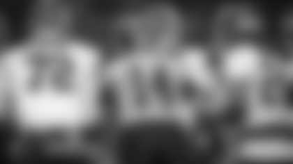 Ryan Fitzpatrick gives a play in the huddle during Washington's minicamp. (Emilee Fails/Washington Football Team)