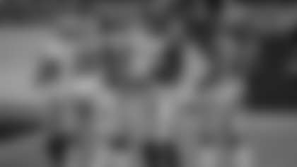 Running back Antonio Gibson (left) and tight end Logan Thomas celebrate a big run from Gibson during the Washington Football Team's win over the Dallas Cowboys on Oct. 25, 2020. (Elijah Walter Griffin Sr./Washington Football Team)