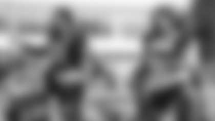 Chase Young and Montez Sweat warm up before practice. (Emilee Fails/Washington Football Team)