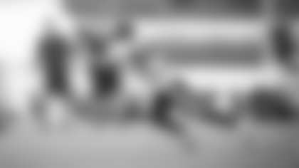 Dax Milne lays out to make a catch while working against Jimmy Moreland. (Emilee Fails/Washington Football Team)