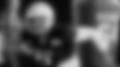 National Team defensive lineman Tyreke Smith of Ohio State (51) runs through drills during practice for the Senior Bowl NCAA college football game Thursday, Feb. 3, 2022, in Mobile, Ala. (AP Photo/Butch Dill)