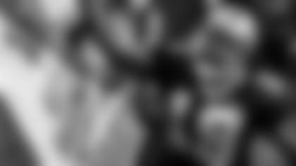 New Orleans Saints wide receiver Devery Henderson (19) shakes with fans after scoring on a 44-yard touchdown pass during the second quarter of an NFL football divisional playoff game against the Arizona Cardinals in New Orleans, Saturday, Jan. 16, 2010.