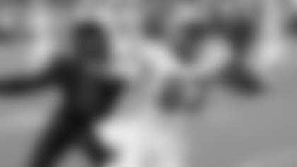 New Orleans Saints tight end Juwan Johnson (83) carries for a touchdown against Arizona Cardinals linebacker Myjai Sanders (41) during the second half of an NFL football game, Thursday, Oct. 20, 2022, in Glendale, Ariz. (/)