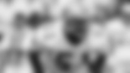 New Orleans Saints linebacker Sam Mills (51) looks on during an NFL football game against the Los Angeles Rams, Oct. 22, 1989 in Anaheim, Calif. The Saints won the game 40-21.