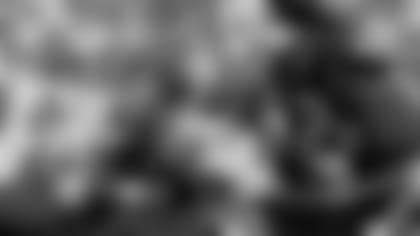 San Francisco 49ers full back Roger Craig, right, runs for a good gain with the ball as New Orleans Saints linebacker James Haynes attempts to stop him during the second half of their NFL game in San Francisco's Candlestick Park, Sept. 22, 1986. The 49ers defeated the Saints, 26-17. (AP Photo/Jeff Reinking)