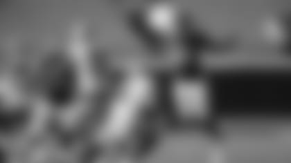 Check out photos of the New Orleans Saints new roster addition, defensive end Tanoh Kpassagnon, throughout his NFL career.