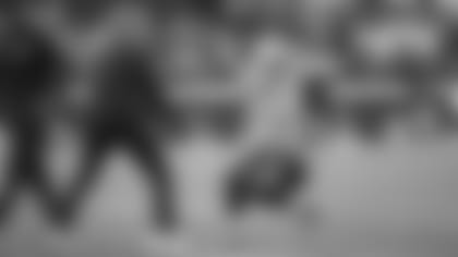 Seahawks quarterback Russell Wilson is fired up as he celebrates with head coach Pete Carroll after Wilson scored on a four-yard run in the fourth quater.